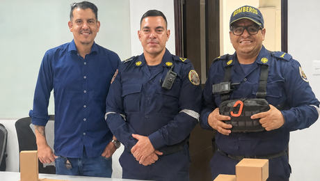 Members of the Cali Volunteer Firefighters with communications devices donated by POCSTARS.